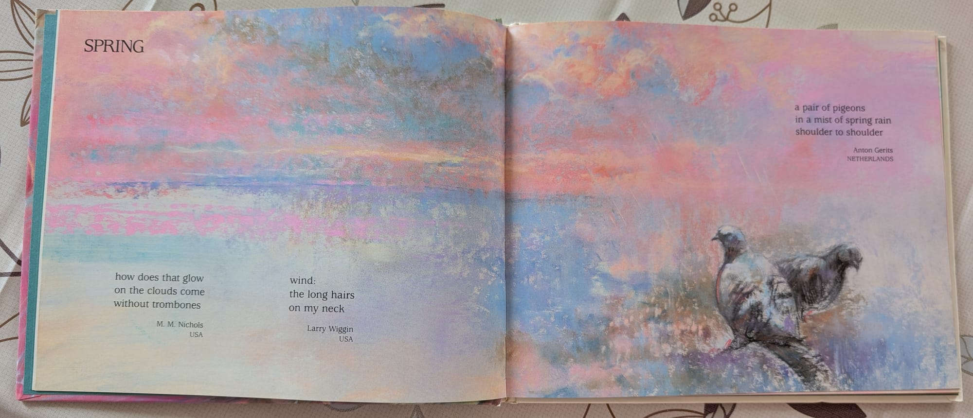 Spring haiku poems with a painting of doves against a pink and gold sunset sky